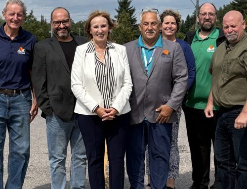 Seven people standing with MP Rochefort